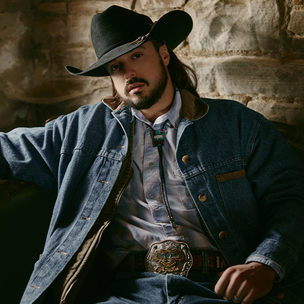 Ian Munsick Showcasing the Eagle Feather Cattle Co. Buckle