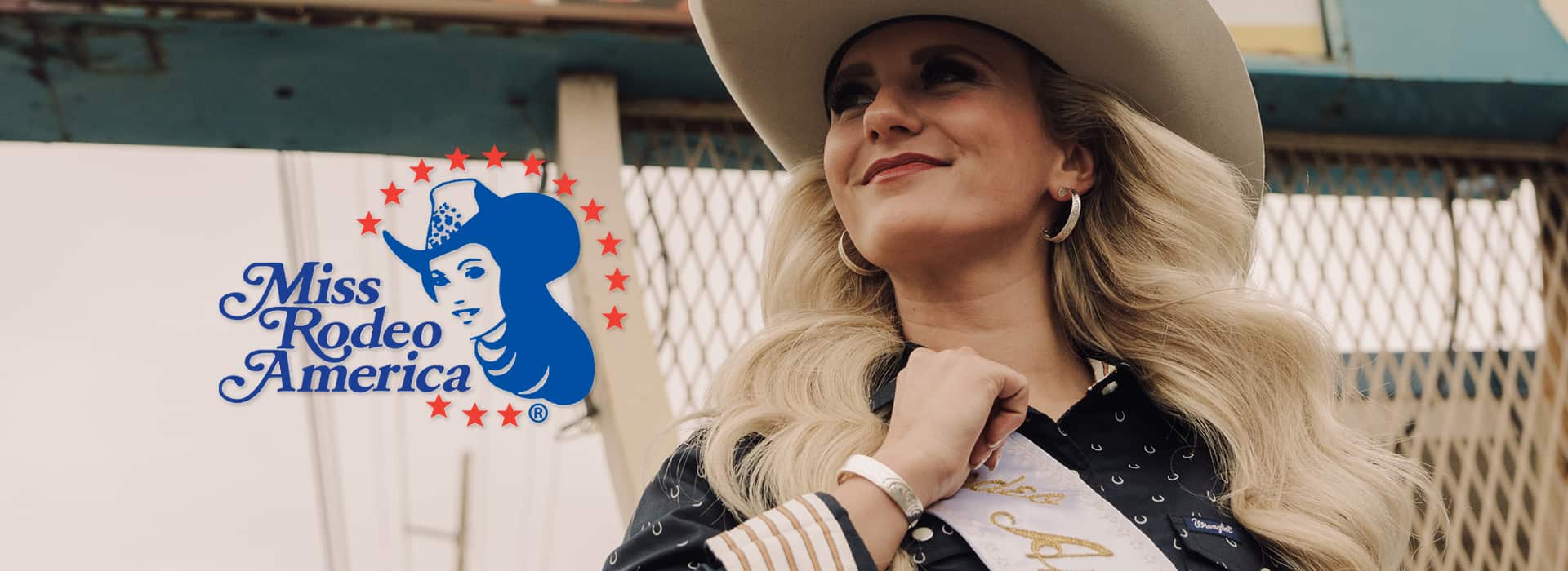 Miss Rodeo America wearing silver bracelet and earrings