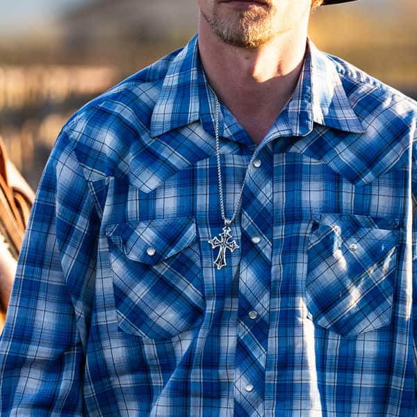 Man wearing cross necklace