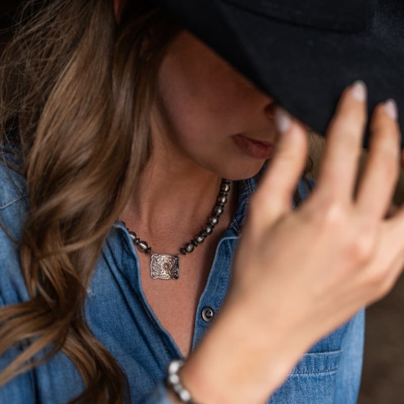 Western Woman in Cowboy Hat and Western Jewelry